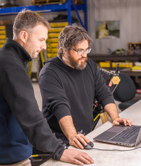 Two engineers working on a project