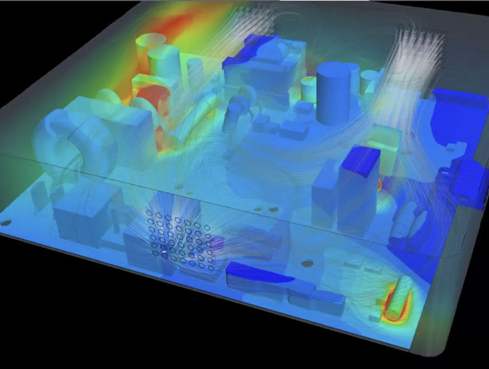 Une visualisation générée par ordinateur sous forme de carte thermique montrant la répartition de l'air et de la température sur un modèle 3D d'une carte de circuit électronique. Les couleurs plus chaudes indiquent des températures plus élevées, allant du bleu (plus froid) au rouge (plus chaud). Les lignes représentent les chemins de circulation de l'air.